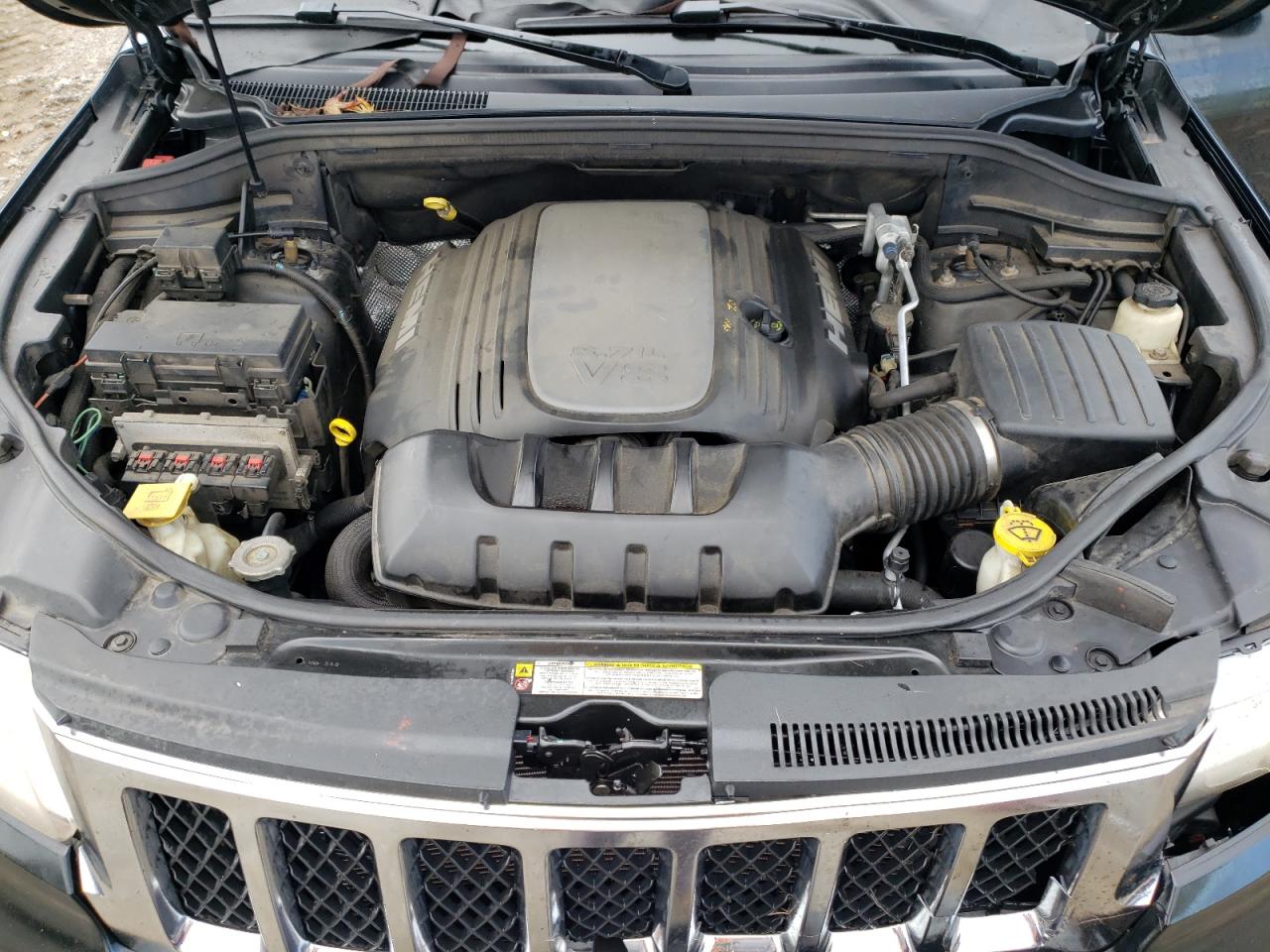 2012 Jeep Grand Cherokee VIN 1C4RJFCT0CC228645 Copart auction photo, front end / undercarriage damage thumbnail 12