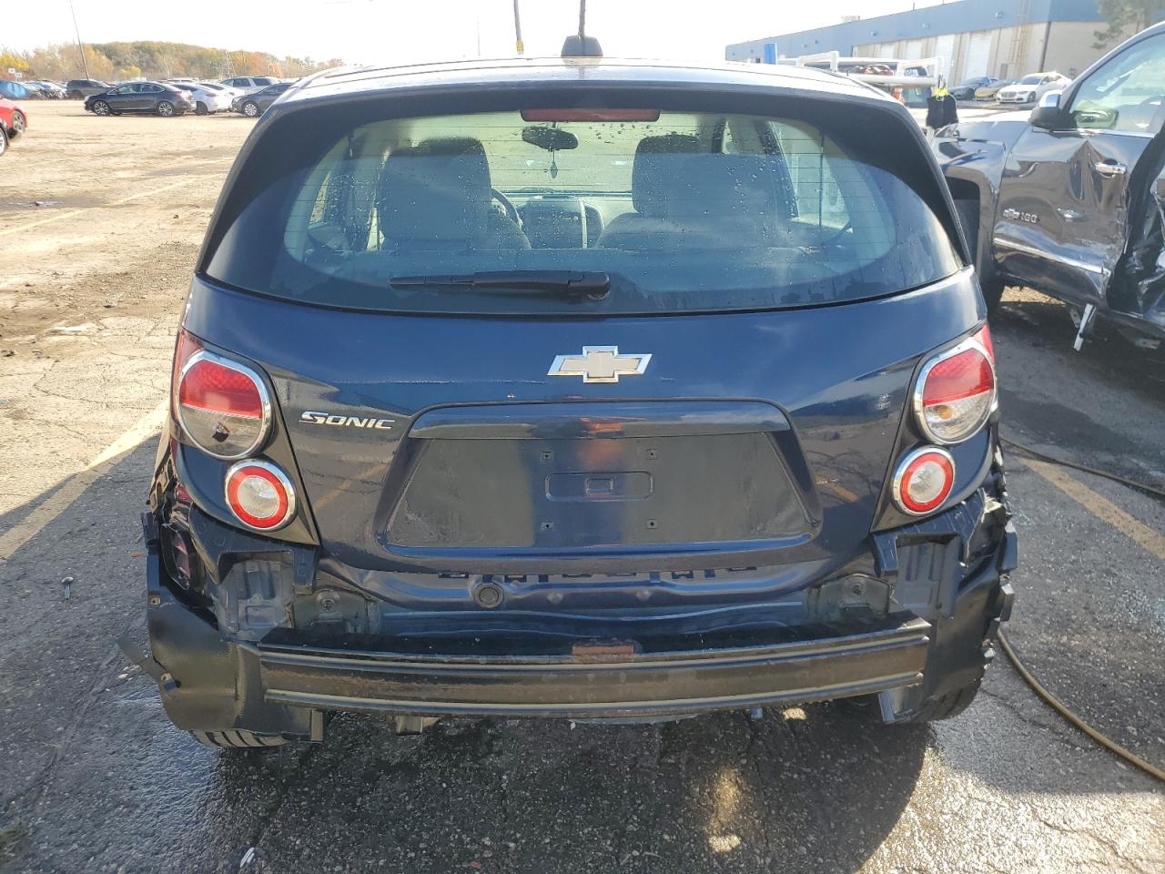 2015 Chevrolet Sonic VIN 1G1JA6SH9F4171072 Copart auction photo, all over damage thumbnail 6