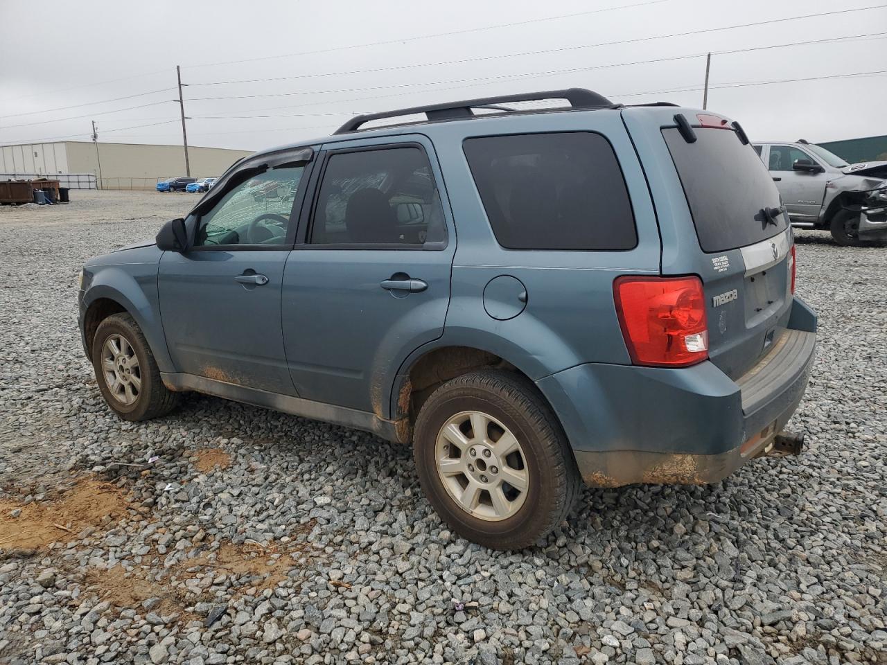2010 Mazda Tribute VIN 4F2CY0C77AKM03655 Copart auction photo, top/roof / minor dent/scratches damage thumbnail 2