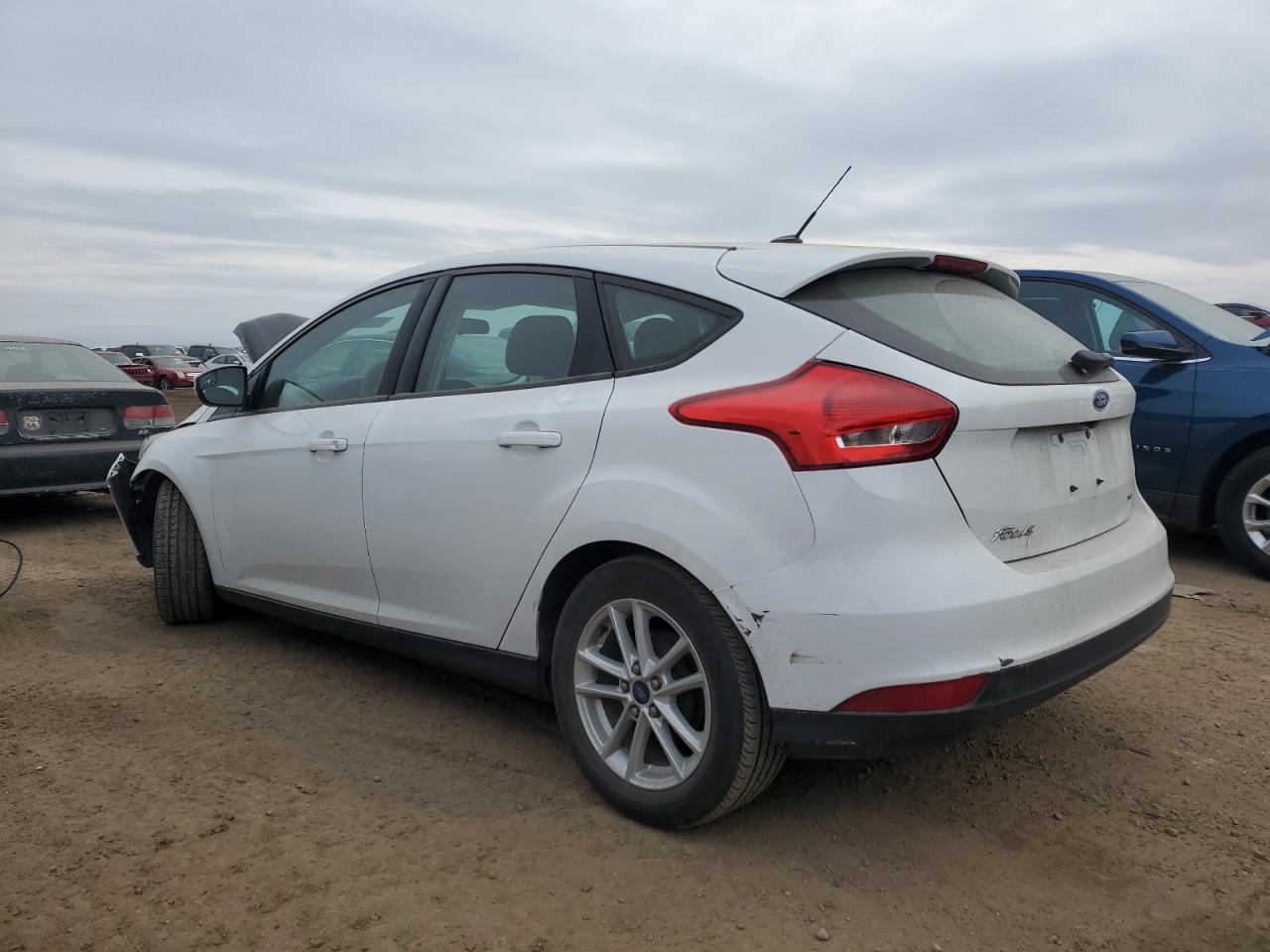 2015 Ford Focus VIN 1FADP3K25FL275857 Copart auction photo, front end / minor dent/scratches damage thumbnail 2