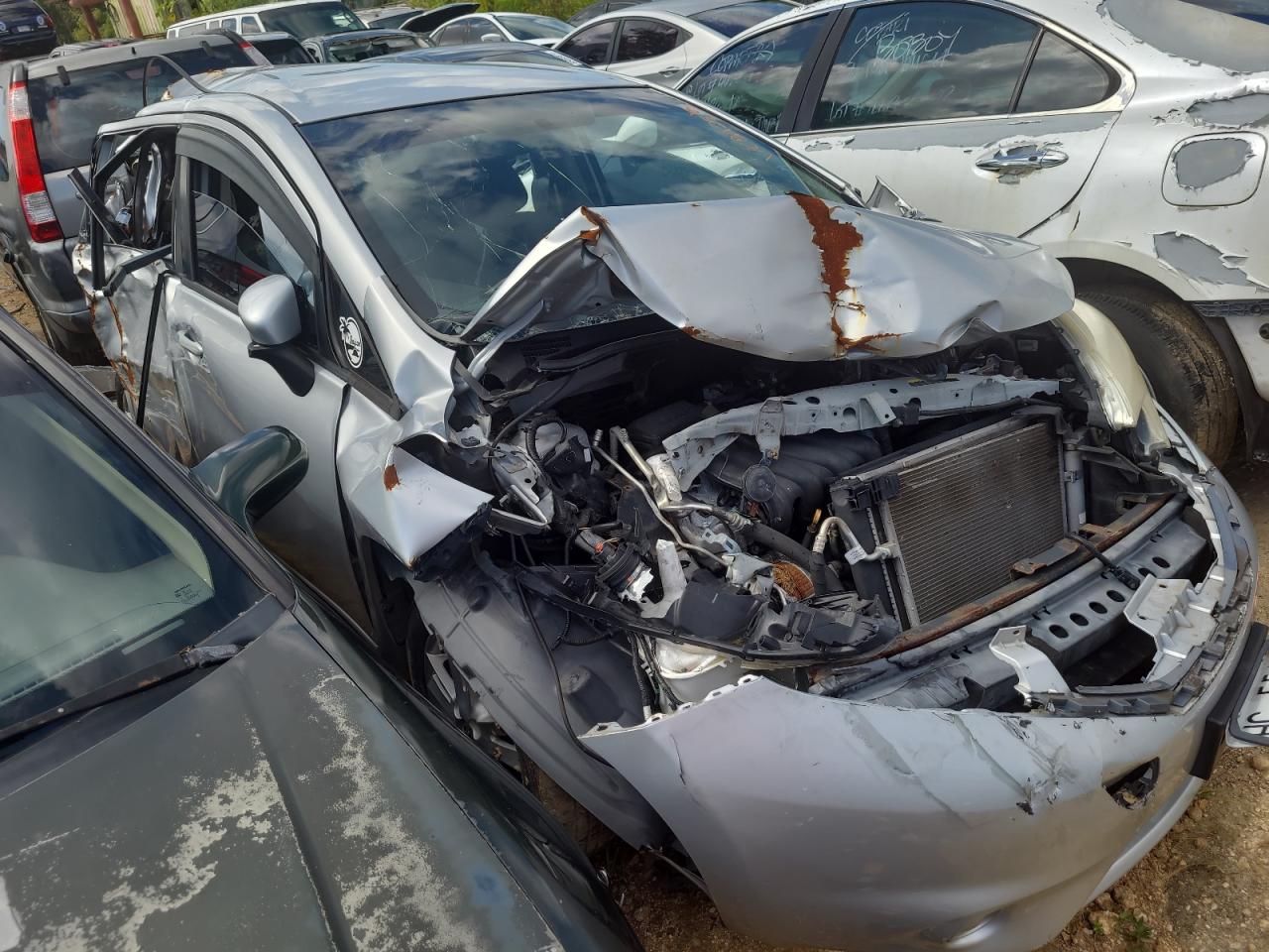 2015 Nissan Versa VIN 3N1CE2CP0FL407821 Copart auction photo, all over damage thumbnail 4