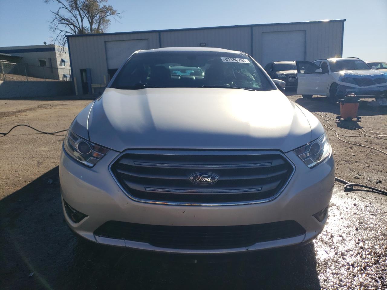 2017 Ford Taurus VIN 1FAHP2E82HG125731 Copart auction photo, rollover damage thumbnail 5