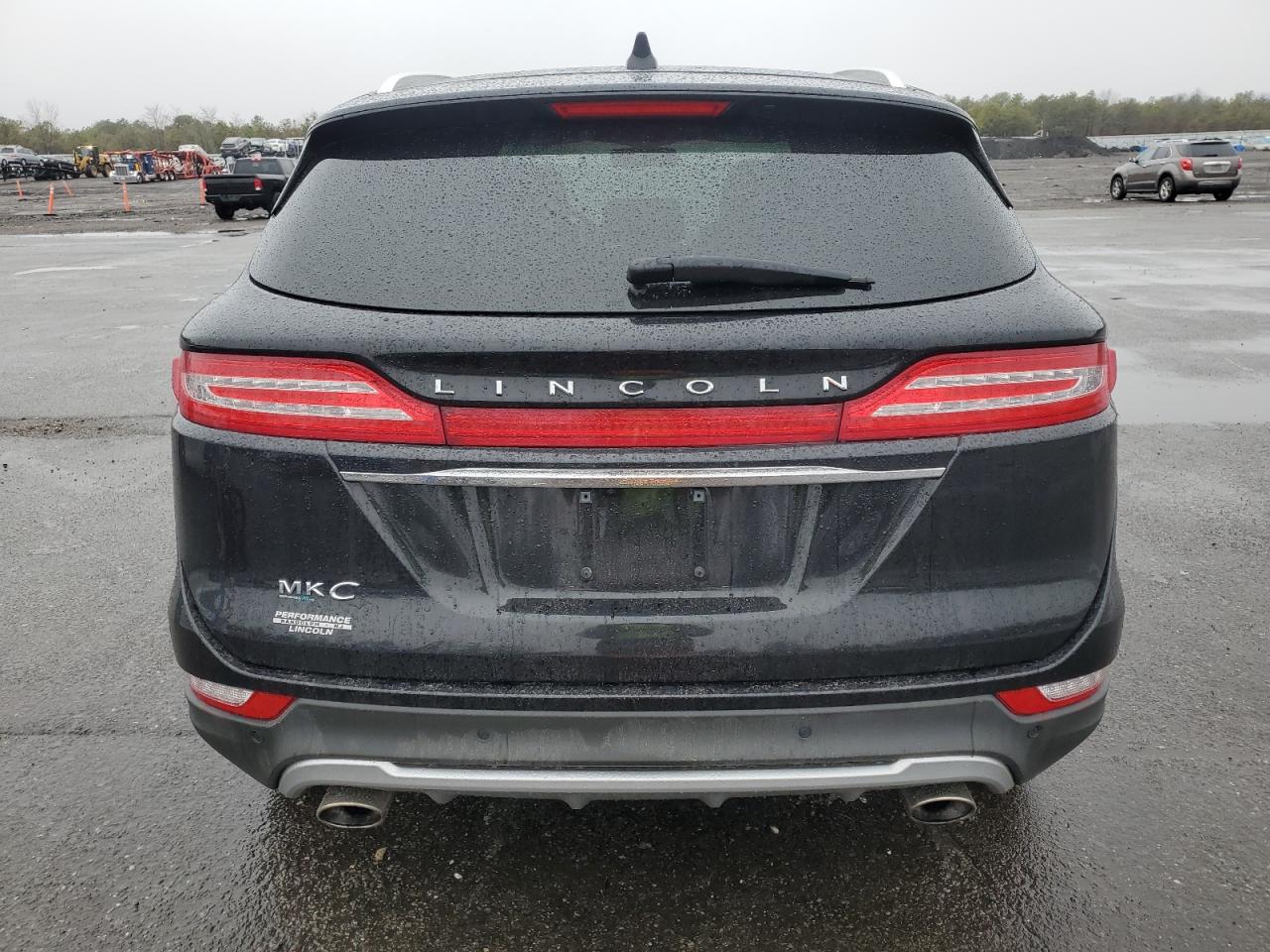 2019 Lincoln MKC VIN 5LMCJ3D92KUL27556 Copart auction photo, front end / minor dent/scratches damage thumbnail 6