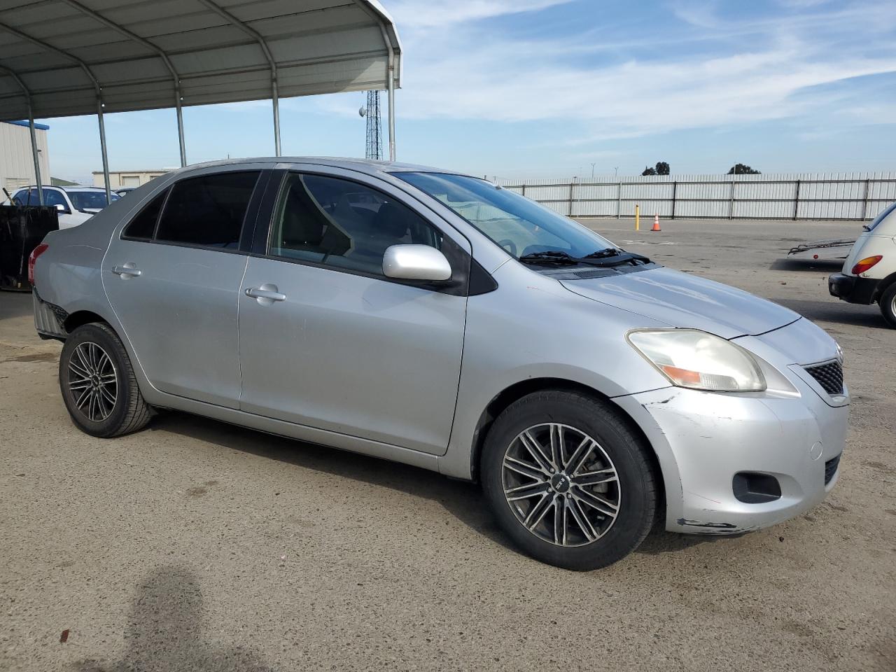 2012 Toyota Yaris VIN JTDBT4K36C1419905 Copart auction photo, rear end damage thumbnail 4