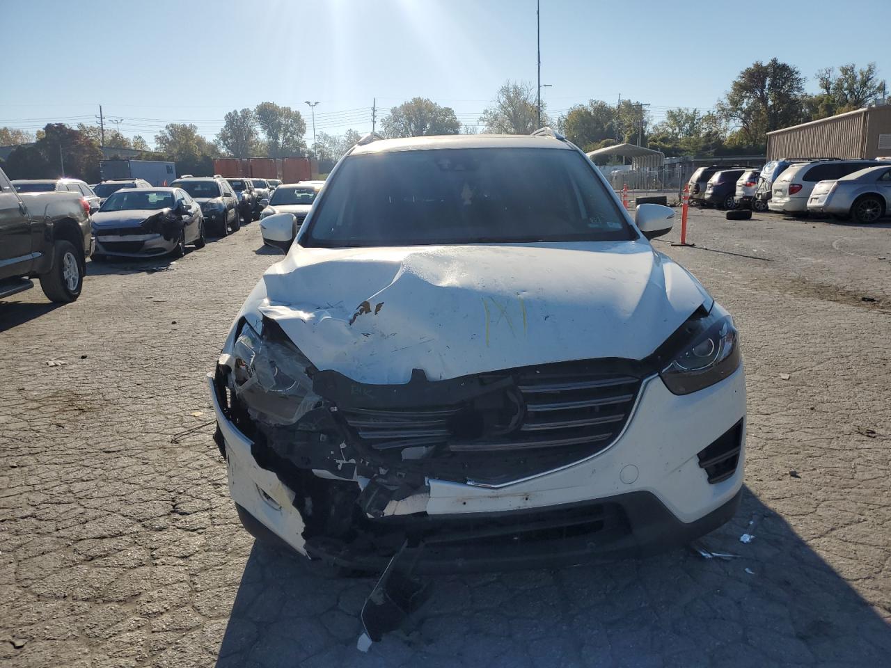 2016 Mazda CX-5 VIN JM3KE2DY5G0700510 Copart auction photo, front end damage thumbnail 5
