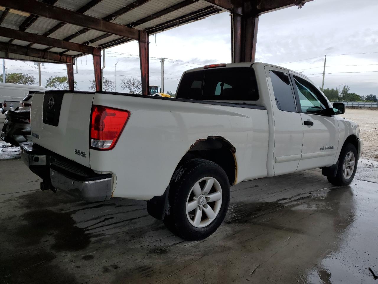 2010 Nissan Titan VIN 1N6AA0CC8AN318599 Copart auction photo, minor dent/scratches damage thumbnail 3