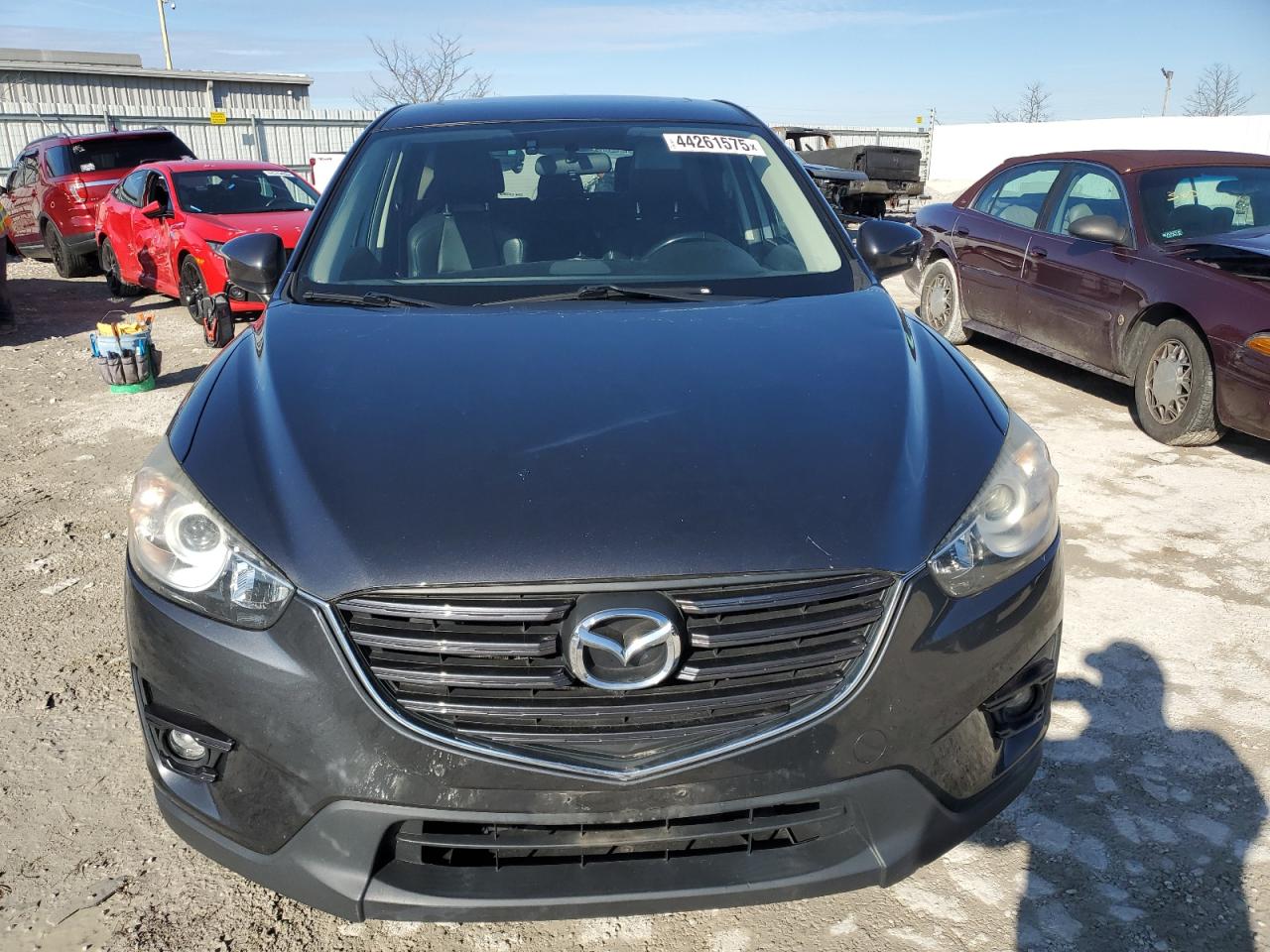 2016 Mazda CX-5 VIN JM3KE4DY5G0631216 Copart auction photo, side damage thumbnail 5