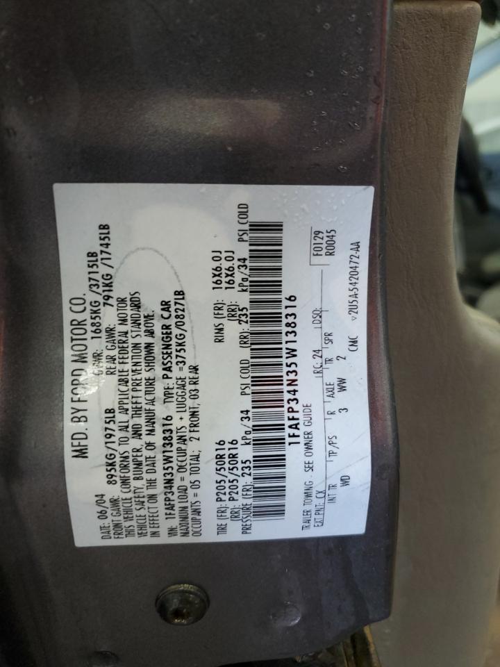 2005 Ford Focus VIN 1FAFP34N35W138316 Copart auction photo, all over damage thumbnail 13