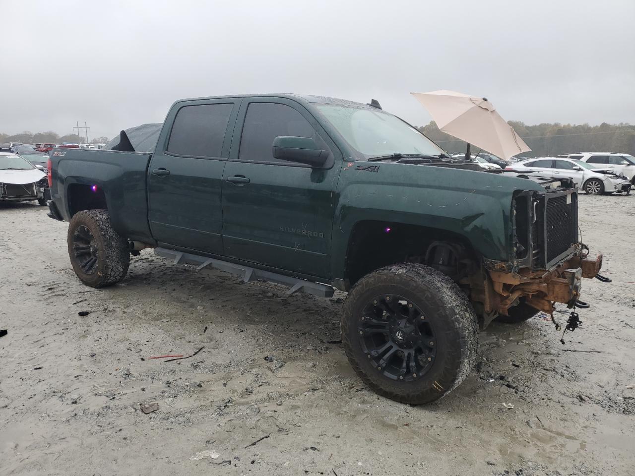 2015 Chevrolet Silverado VIN 3GCUKREC0FG253908 Copart auction photo, front end damage thumbnail 4