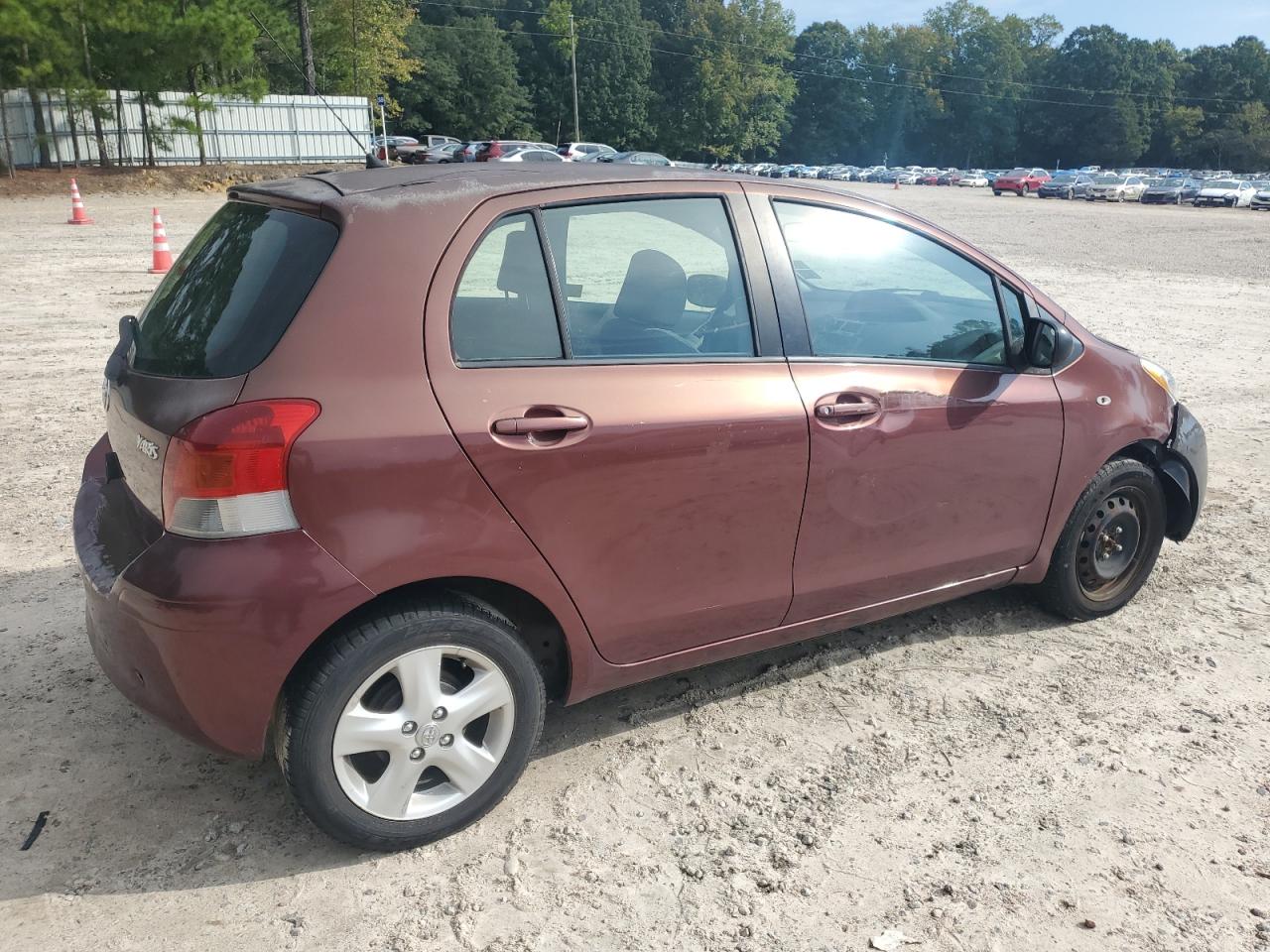 2010 Toyota Yaris VIN JTDKT4K36A5302525 Copart auction photo, side / minor dent/scratches damage thumbnail 3