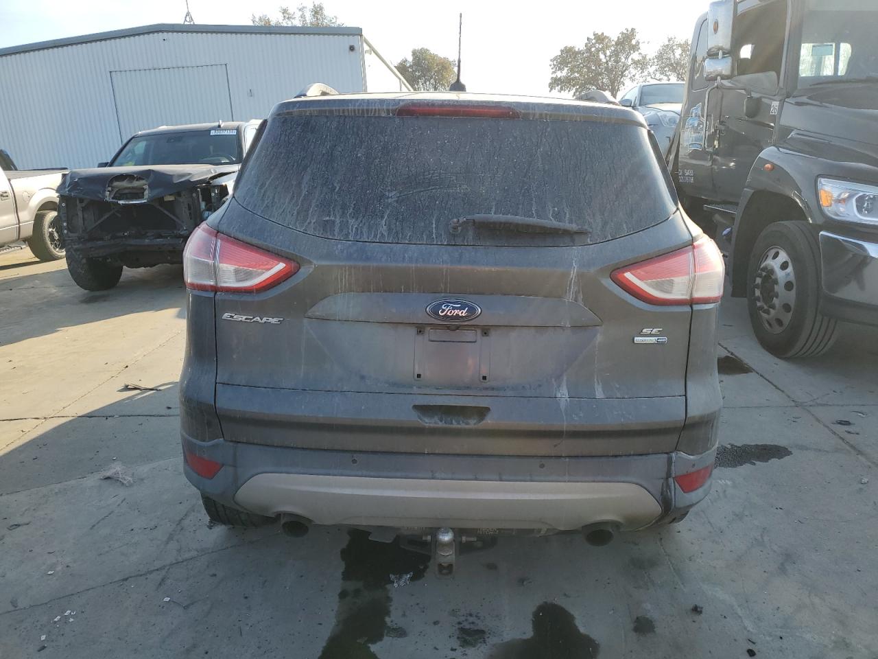 2015 Ford Escape VIN 1FMCU9GX0FUB73460 Copart auction photo, burn - engine damage thumbnail 6