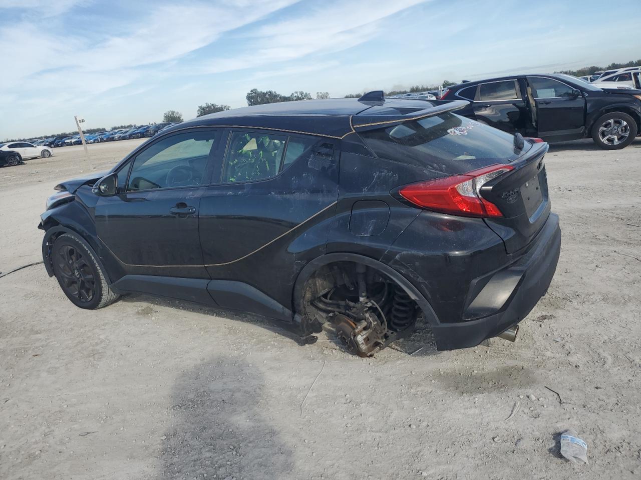 2021 Toyota C-HR VIN JTNKHMBX0M1100906 Copart auction photo, front end / rear end damage thumbnail 2