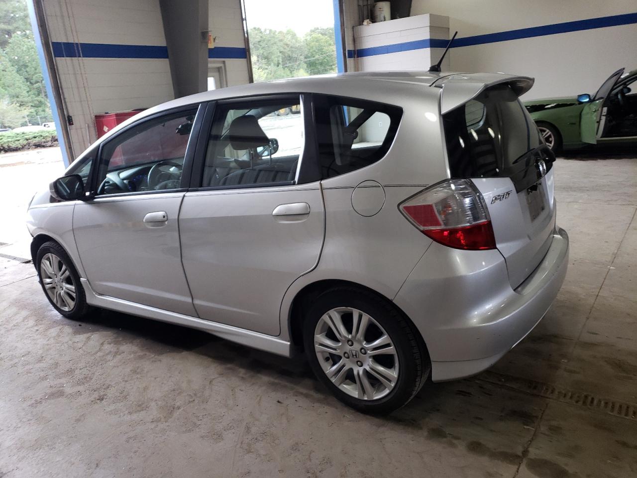 2011 Honda Fit VIN JHMGE8G57BS001071 Copart auction photo, front end damage thumbnail 2