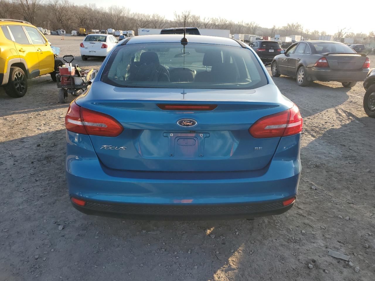 2015 Ford Focus VIN 1FADP3F23FL327335 Copart auction photo, side / minor dent/scratches damage thumbnail 6