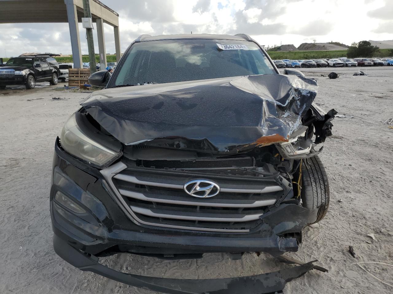 2016 Hyundai Tucson VIN KM8J33A41GU233611 Copart auction photo, front end / minor dent/scratches damage thumbnail 5