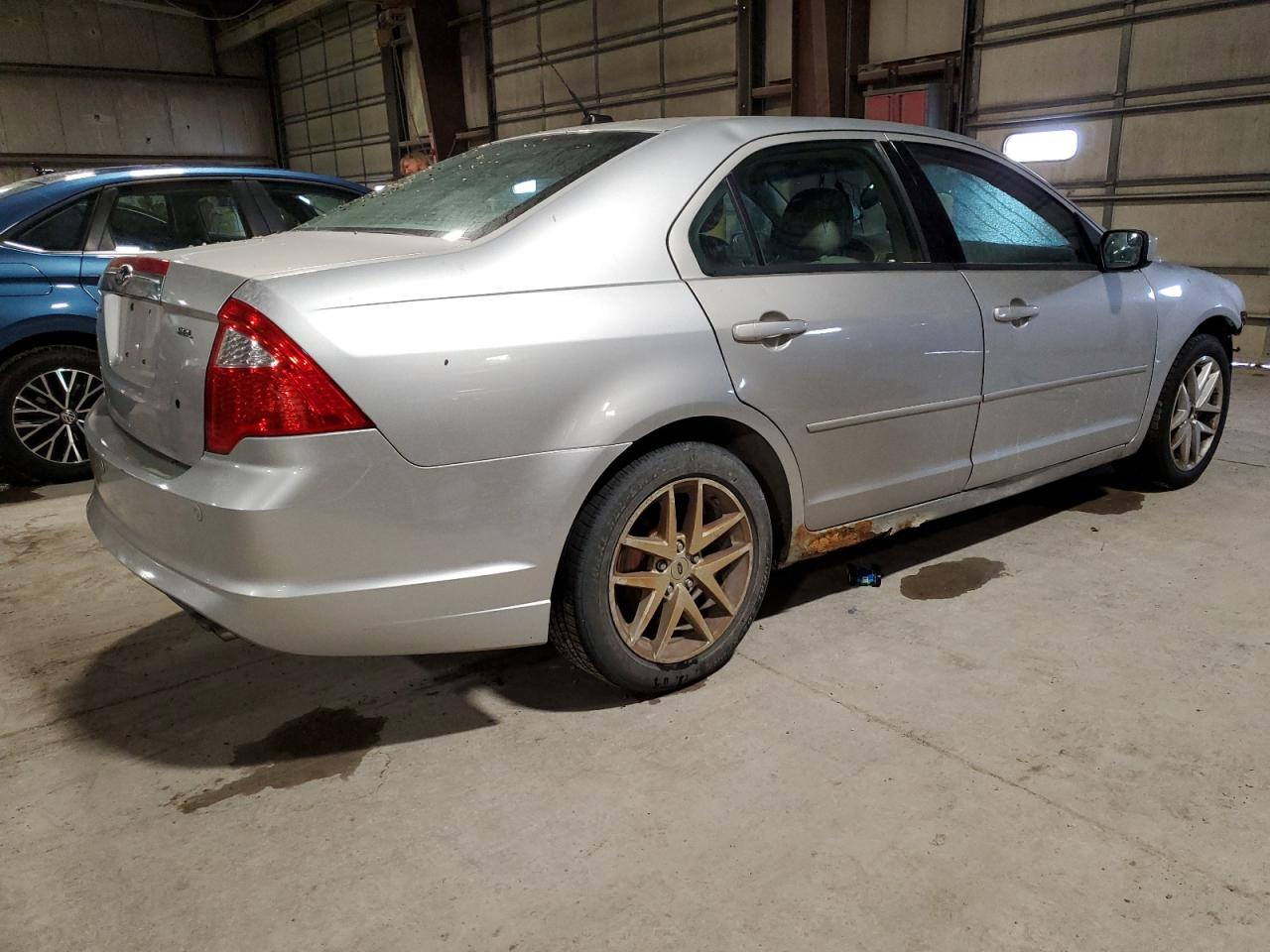 2012 Ford Fusion VIN 3FAHP0JA8CR144055 Copart auction photo, vandalism / front end damage thumbnail 3