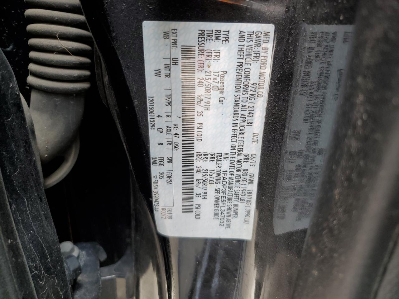 2015 Ford Focus VIN 1FADP3FE5FL347032 Copart auction photo, side / rear end damage thumbnail 12