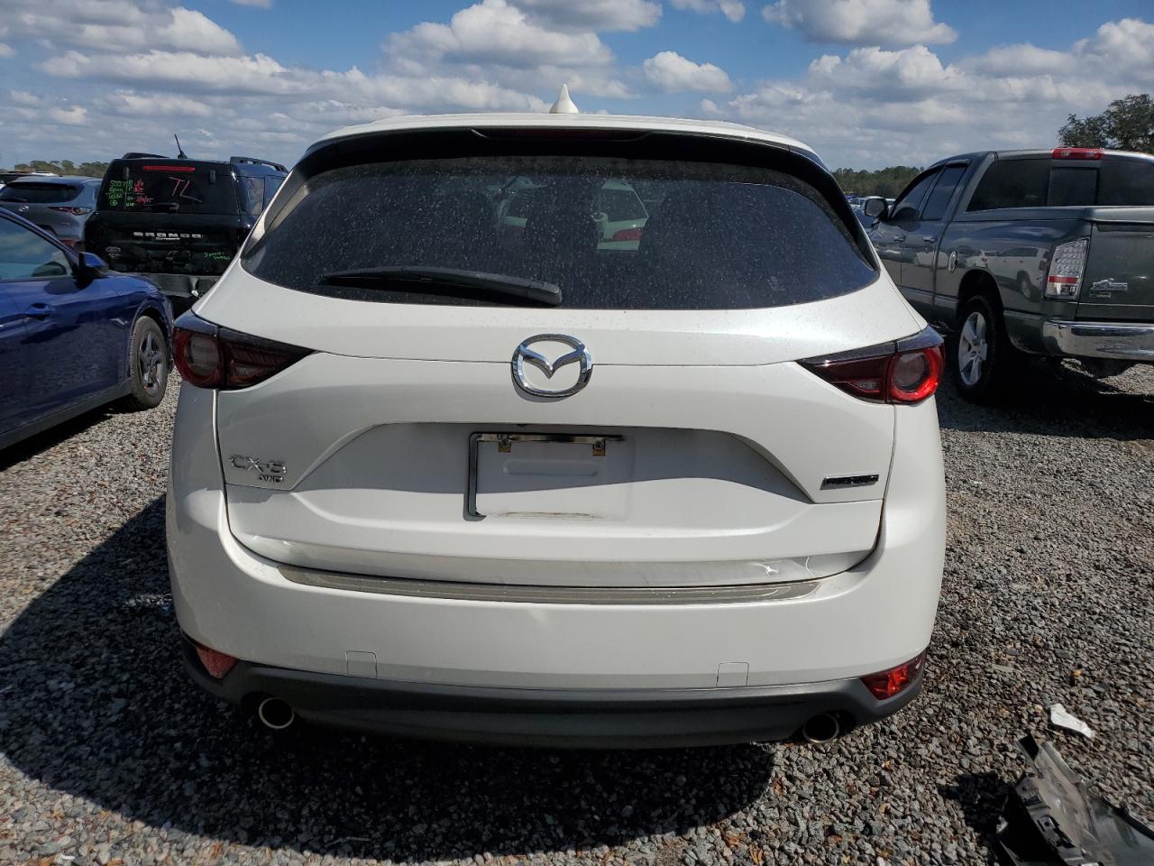 2021 Mazda CX-5 VIN JM3KFBCM3M1494718 Copart auction photo, front end / side damage thumbnail 6