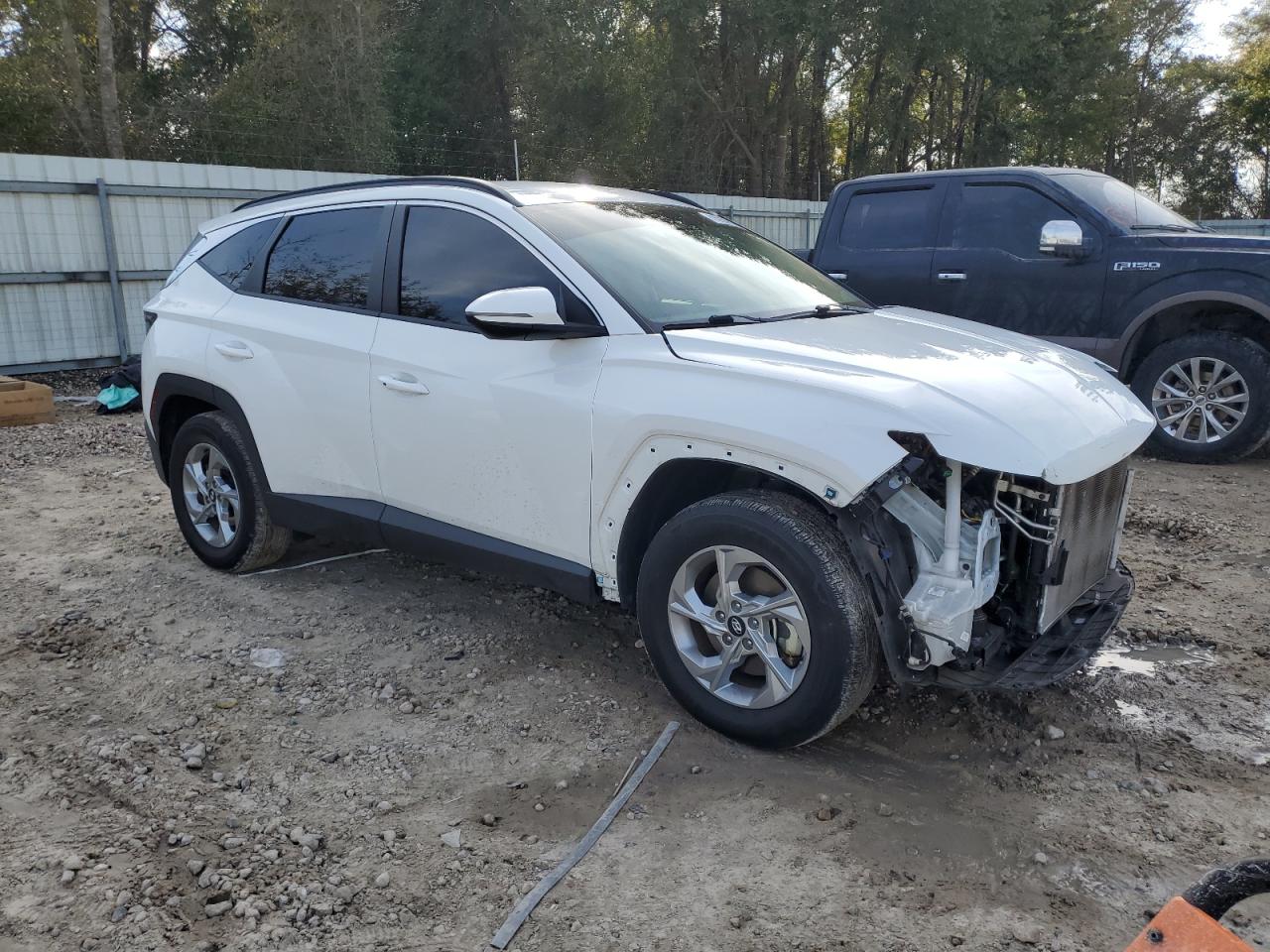 2022 Hyundai Tucson VIN 5NMJBCAE4NH129649 Copart auction photo, front end damage thumbnail 4