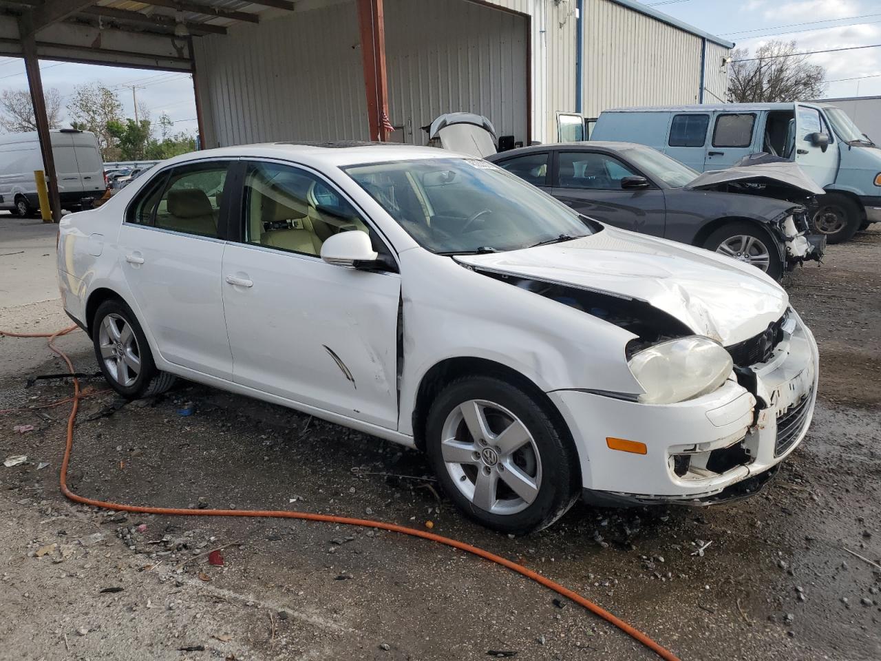 2009 Volkswagen Jetta VIN 3VWRM71K09M090083 Copart auction photo, front end damage thumbnail 4