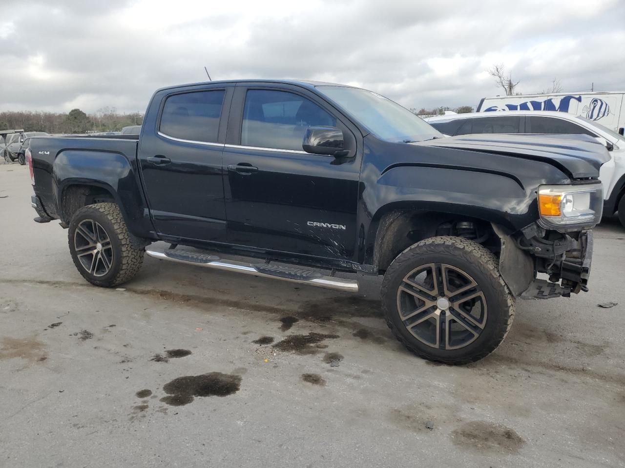 2018 GMC Canyon VIN 1GTG6CEN3J1165880 Copart auction photo, front end / side damage thumbnail 4