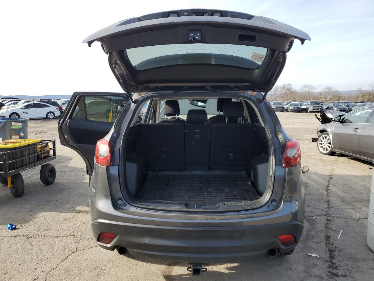 2016 Mazda CX-5 VIN JM3KE4CY8G0681660 Copart auction photo, rear end / side damage thumbnail 6