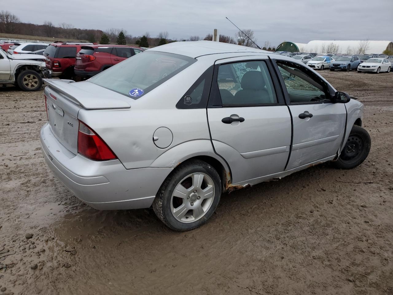 2005 Ford Focus VIN 1FAFP34N85W300182 Copart auction photo, side / front end damage thumbnail 3