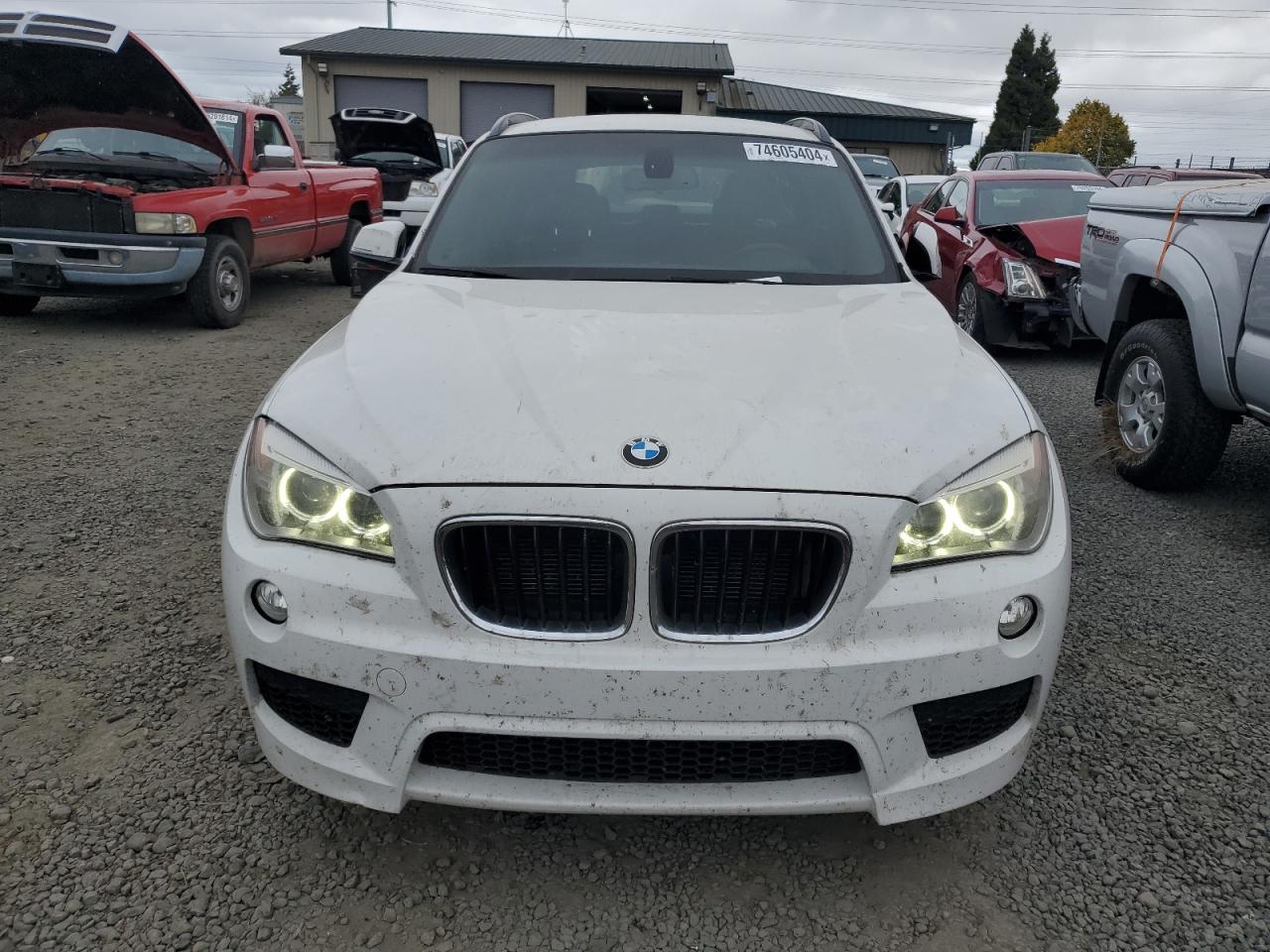 2014 BMW X1 VIN WBAVL1C55EVY18258 Copart auction photo, undercarriage damage thumbnail 5
