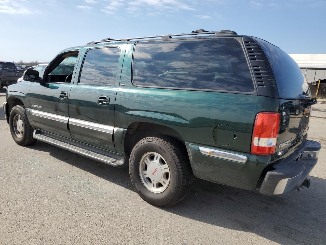 2001 GMC Yukon VIN 3GKEC16TX1G169562 Copart auction photo, vandalism damage thumbnail 2