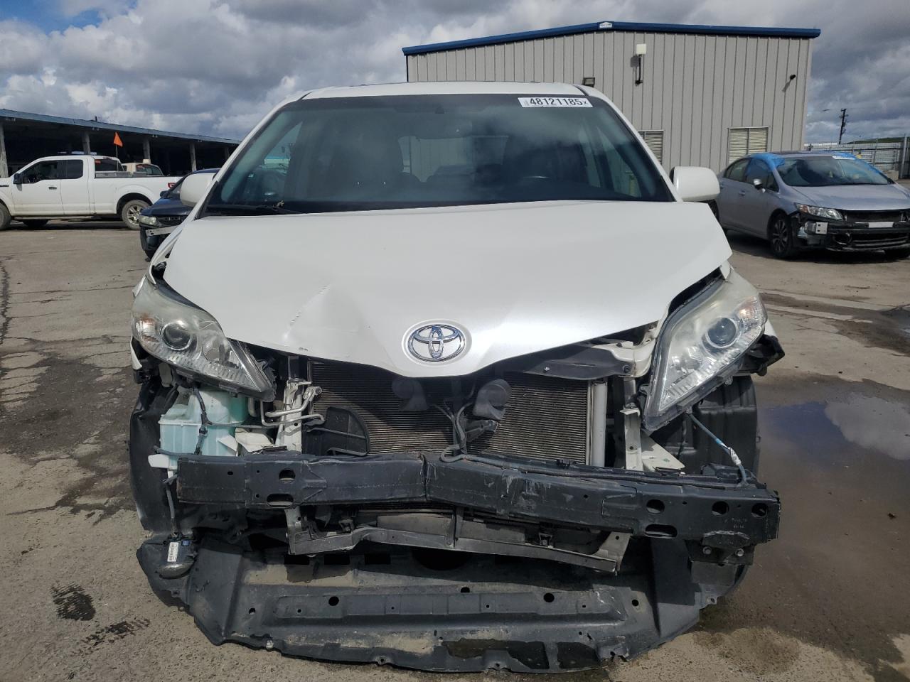 2015 Toyota Sienna VIN 5TDYK3DC9FS601206 Copart auction photo, front end damage thumbnail 5