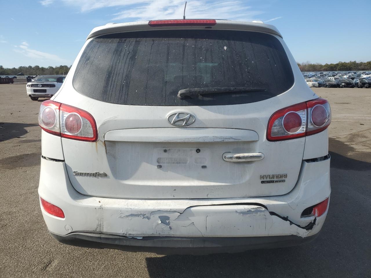 2011 Hyundai Santa Fe VIN 5XYZKDAG7BG009344 Copart auction photo, rear end / minor dent/scratches damage thumbnail 6