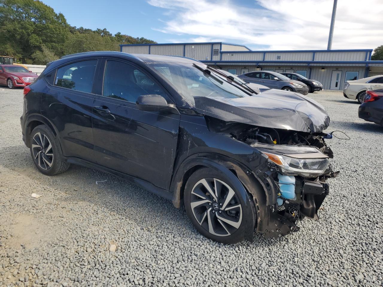 2019 Honda HR-V VIN 3CZRU5H10KM720401 Copart auction photo, front end / side damage thumbnail 4