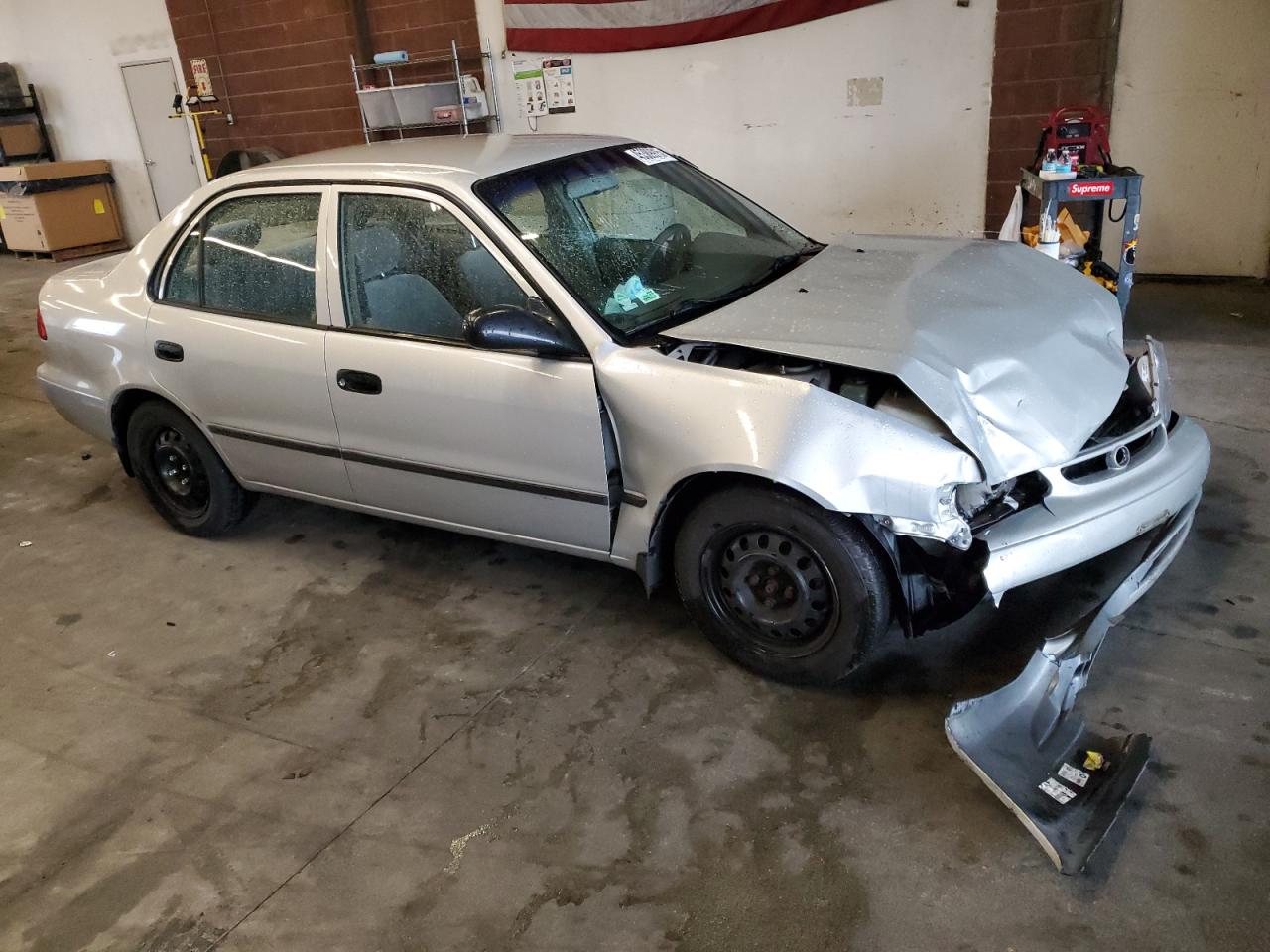 1999 Toyota Corolla VIN 1NXBR18E5XZ168624 Copart auction photo, front end damage thumbnail 4