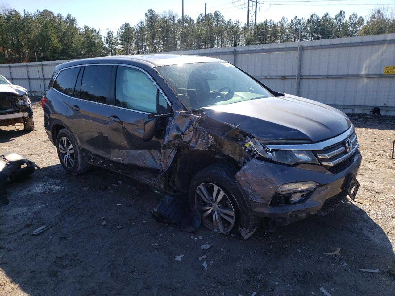 2018 Honda Pilot VIN 5FNYF5H57JB029352 Copart auction photo, all over / undercarriage damage thumbnail 4