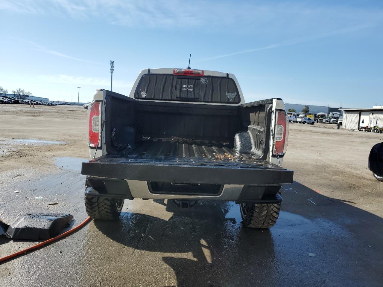 2016 GMC Canyon VIN 1GTP6DE10G1259842 Copart auction photo, water/flood damage thumbnail 6