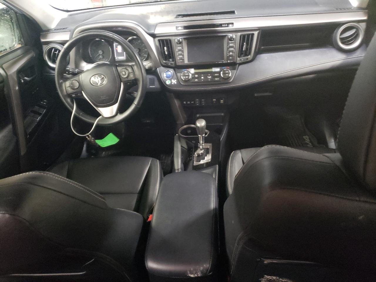 2018 Toyota RAV 4 VIN JTMDJREV4JD201465 Copart auction photo, front end damage thumbnail 8