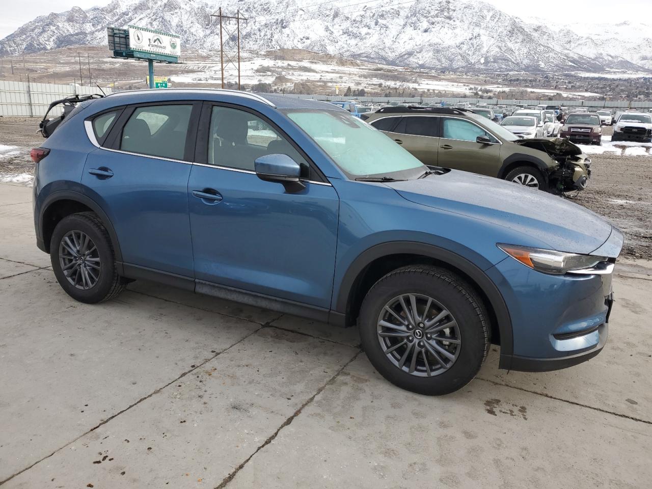 2021 Mazda CX-5 VIN JM3KFBBM1M0312215 Copart auction photo, side damage thumbnail 4