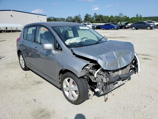 2011 Nissan Versa VIN 3N1BC1CP6BL517603 Copart auction photo, front end / side damage thumbnail 11