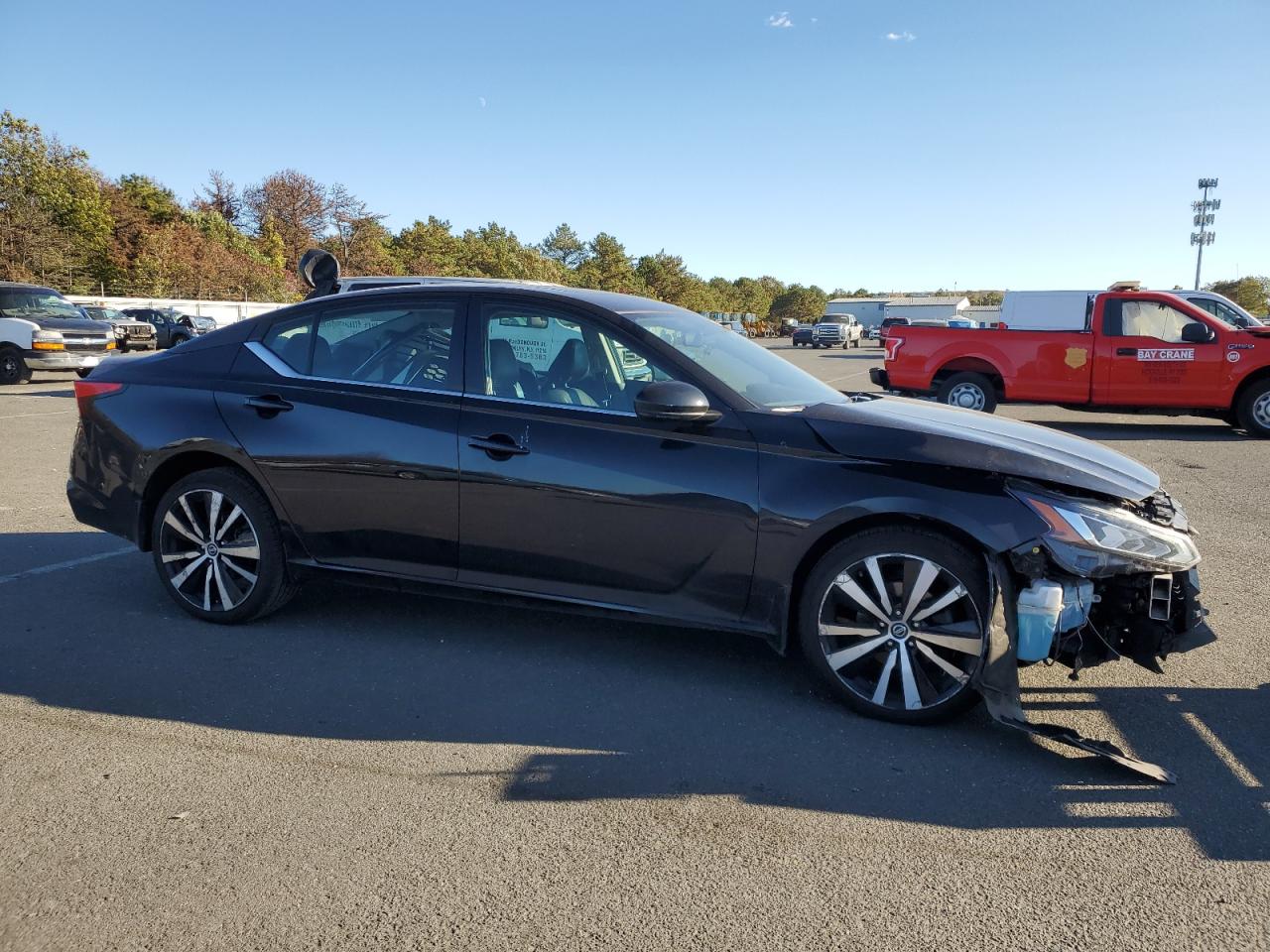 2019 Nissan Altima VIN 1N4BL4CW2KN304160 Copart auction photo, front end / minor dent/scratches damage thumbnail 4