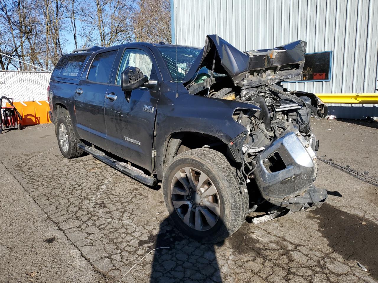 2015 Toyota Tundra VIN 5TFHY5F19FX488759 Copart auction photo, front end / side damage thumbnail 4