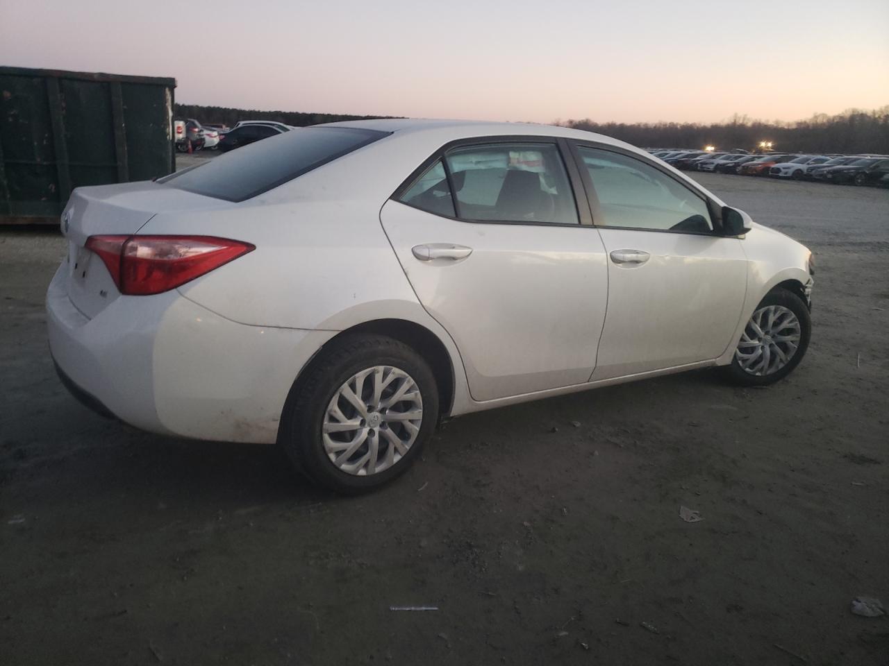 2018 Toyota Corolla VIN 5YFBURHE1JP852107 Copart auction photo, front end / side damage thumbnail 3