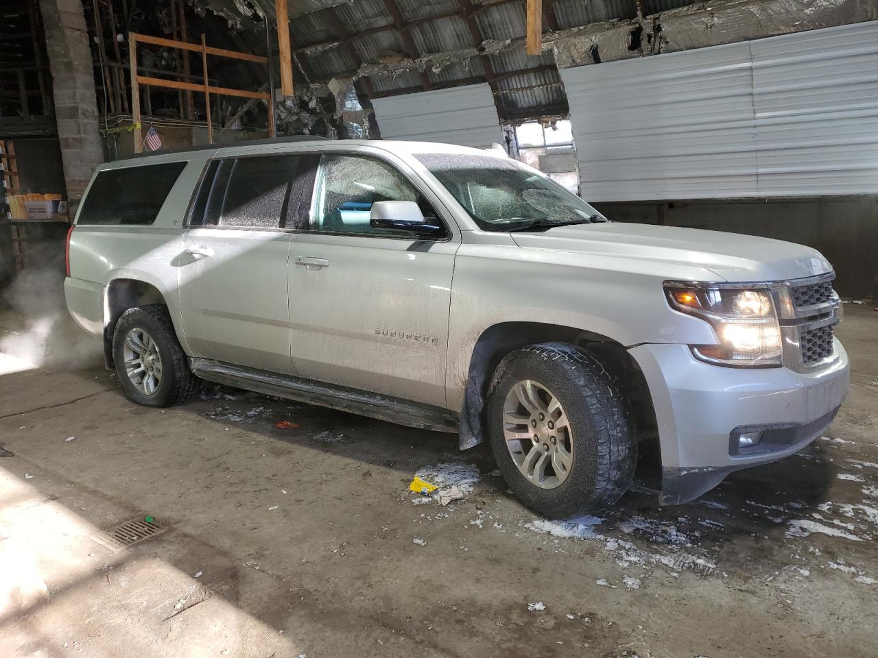 2020 Chevrolet Suburban VIN 1GNSKHKC1LR211787 Copart auction photo, side damage thumbnail 4