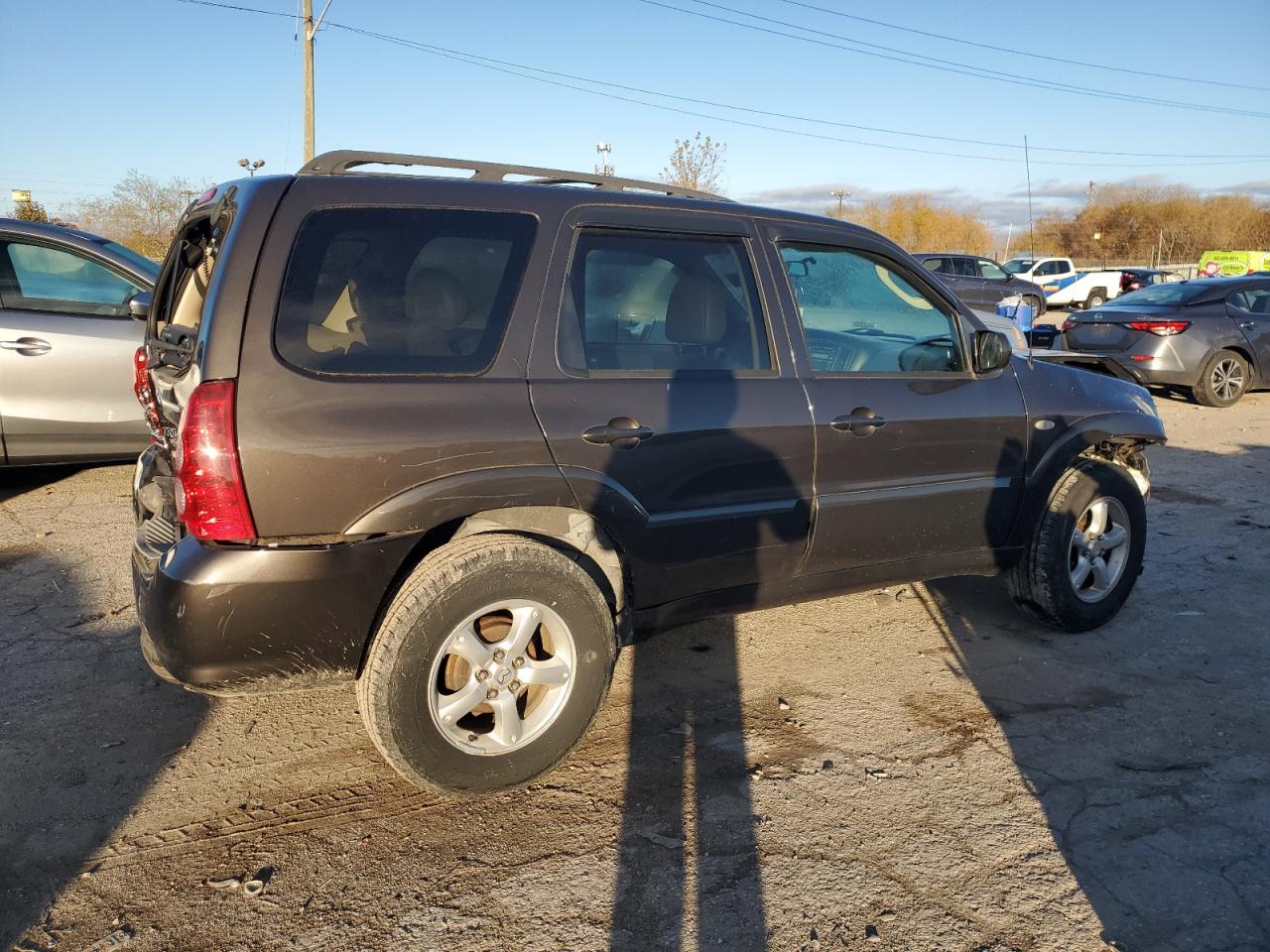 2006 Mazda Tribute VIN 4F2YZ02Z76KM19559 Copart auction photo, rear end / front end damage thumbnail 3