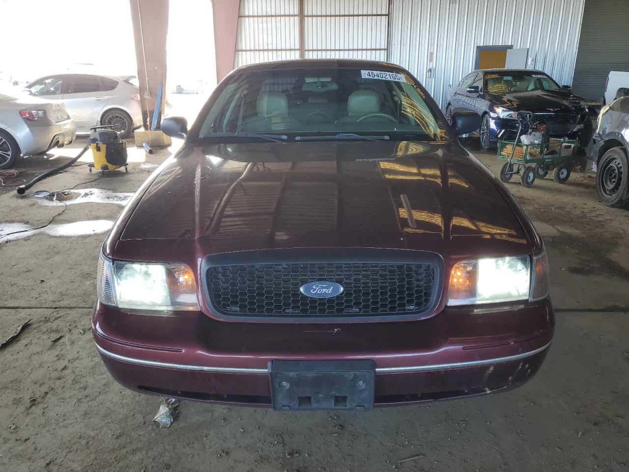 2005 Ford Crown Victoria VIN 2FAFP74W15X130249 Copart auction photo, rear end damage thumbnail 5