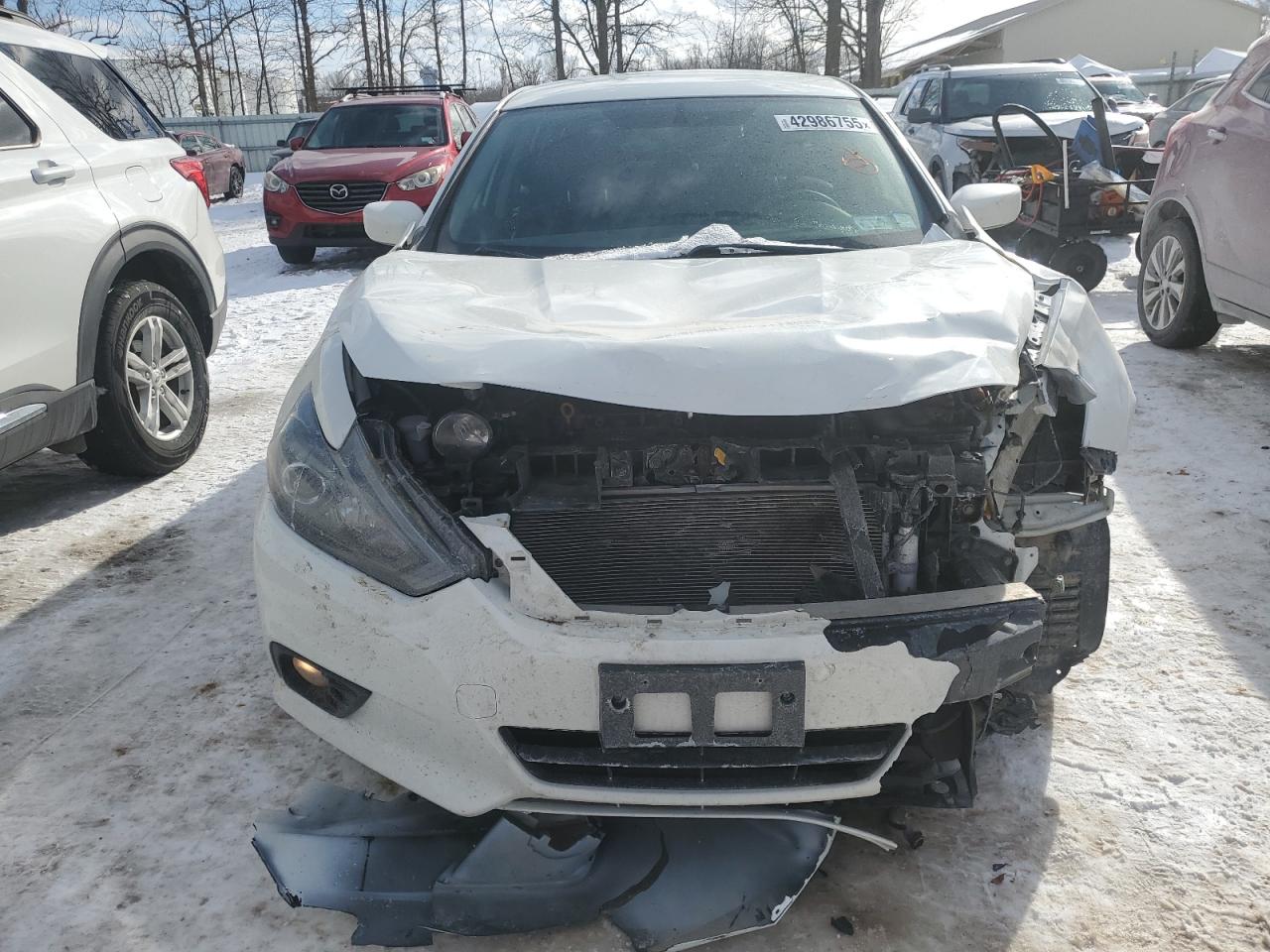 2018 Nissan Altima VIN 1N4AL3AP3JC264585 Copart auction photo, front end / minor dent/scratches damage thumbnail 5