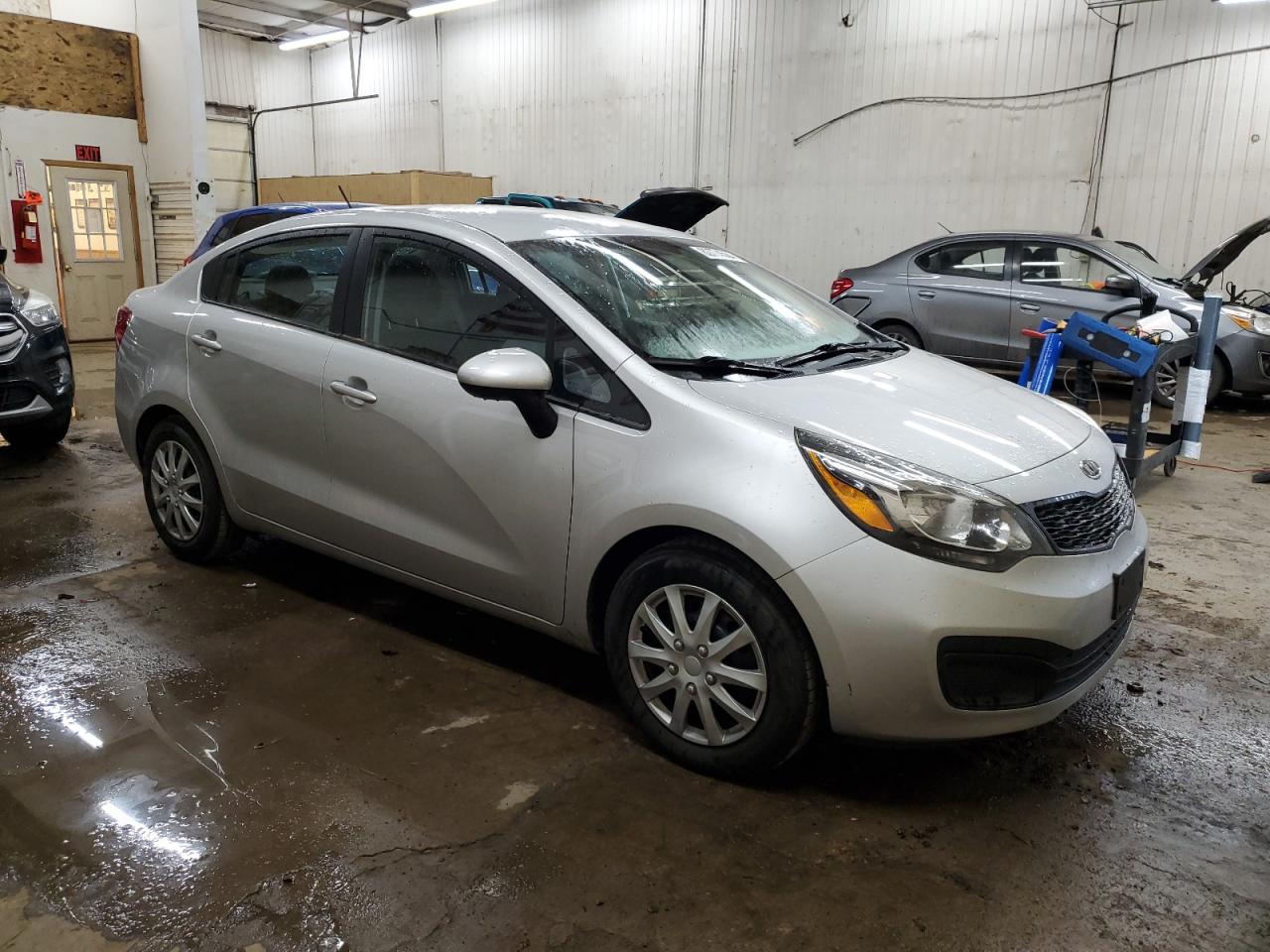2012 KIA Rio VIN KNADM4A3XC6053504 Copart auction photo, minor dent/scratches damage thumbnail 4