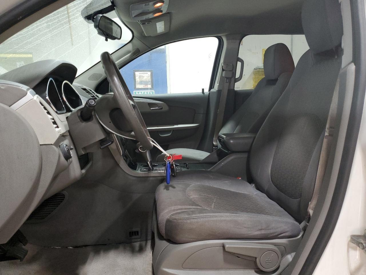2012 Chevrolet Traverse VIN 1GNKREED9CJ309334 Copart auction photo, side / front end damage thumbnail 7
