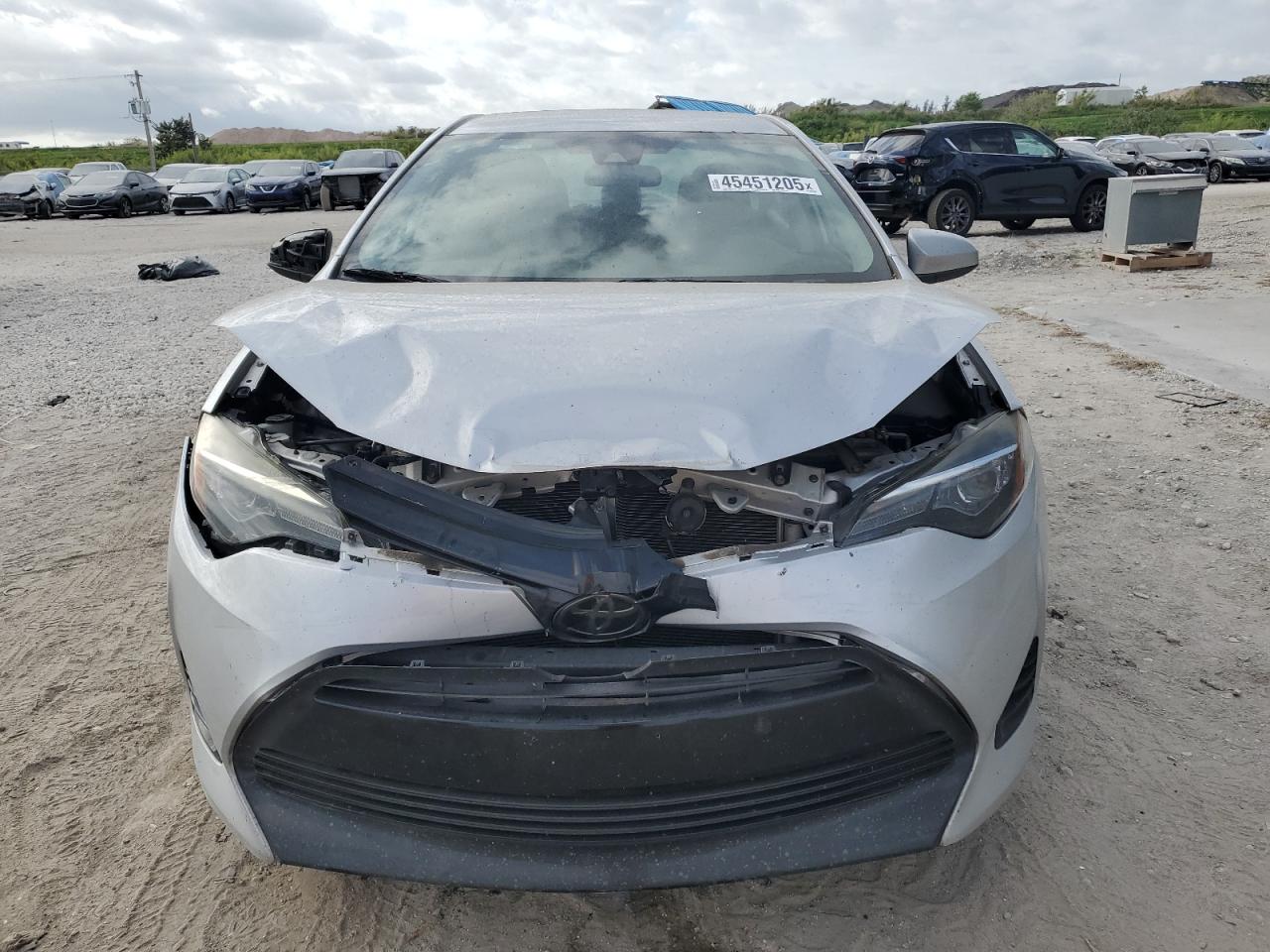 2018 Toyota Corolla VIN 5YFBURHE7JP753095 Copart auction photo, front end / minor dent/scratches damage thumbnail 5