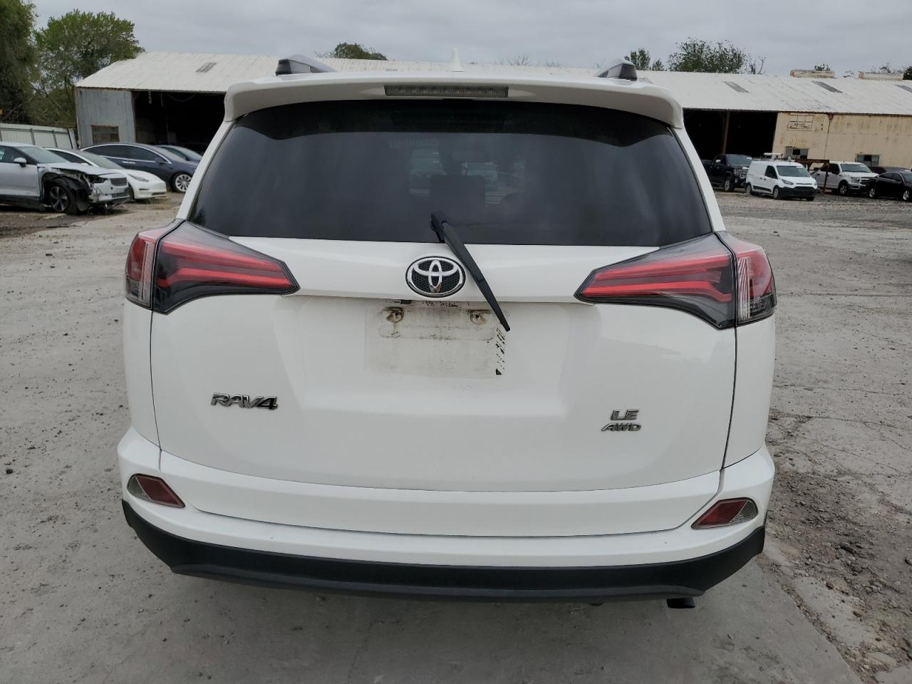 2018 Toyota RAV 4 VIN JTMBFREV7JD257750 Copart auction photo, front end damage thumbnail 6