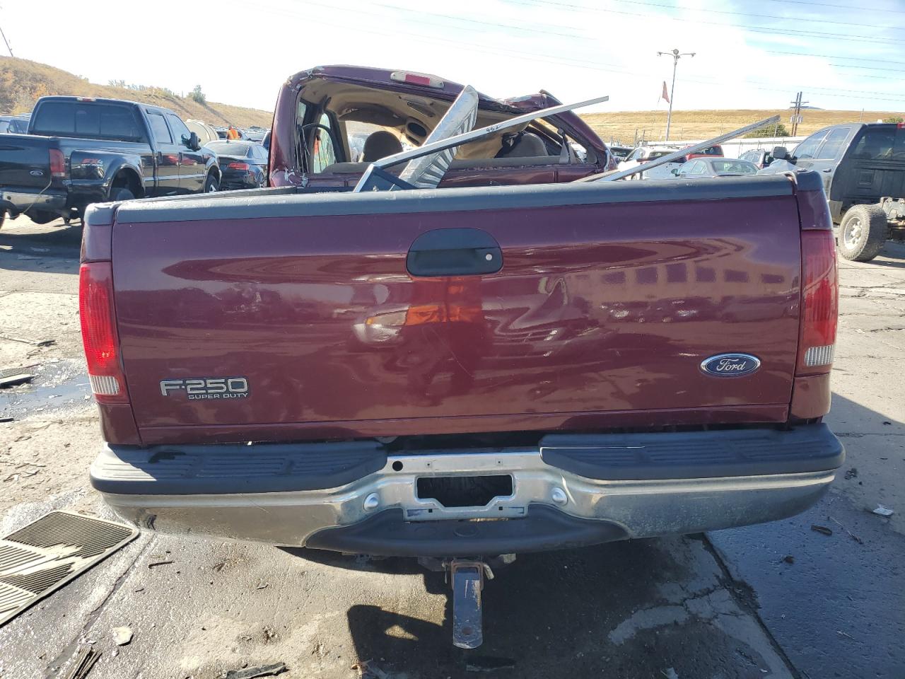 1999 Ford F250 VIN 1FTNW21F7XEE89478 Copart auction photo, rollover damage thumbnail 6